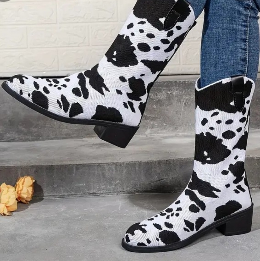 Women's cow print slip on boots